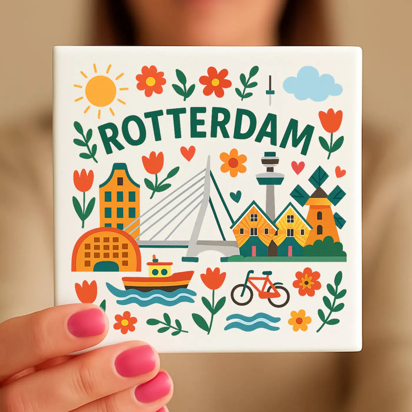 Witte keramische coaster met kleurrijk rotterdam design met oranje tulpen groene gebouwen en een brug