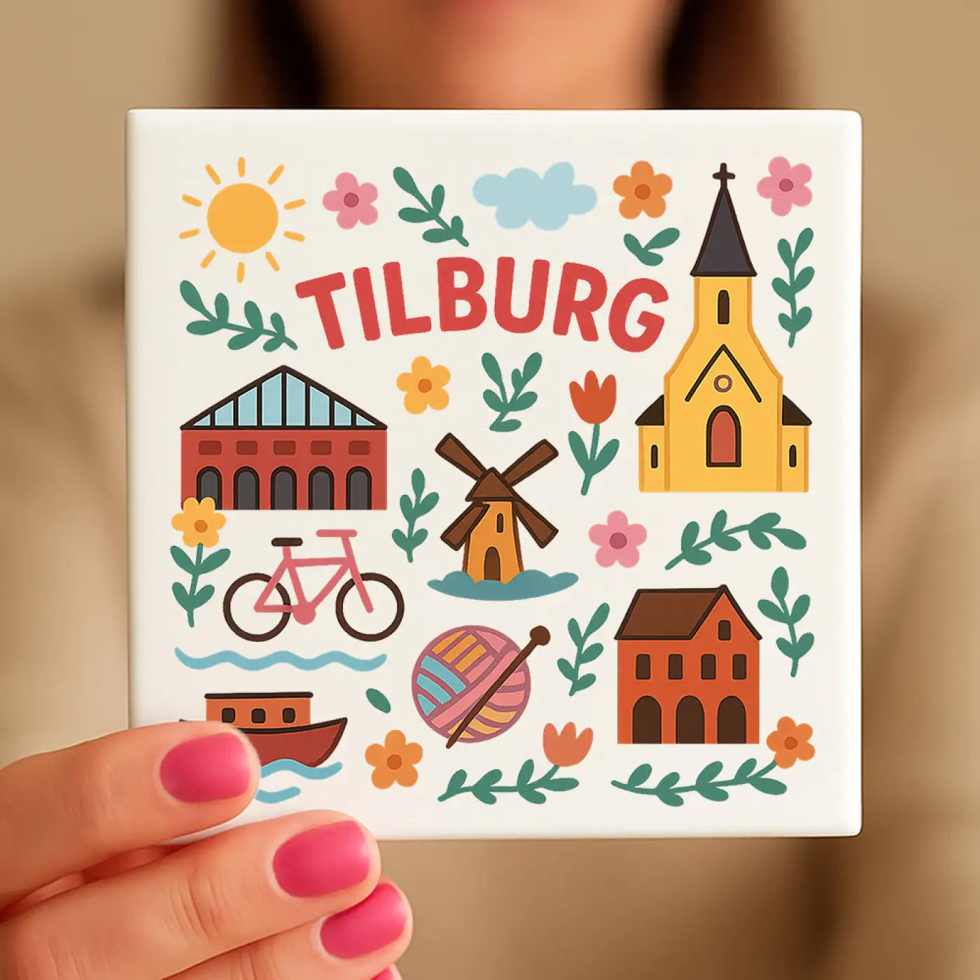 Wit keramische onderzetter met kleurrijk illustratief ontwerp van tilburg met kerk windmolen en fiets